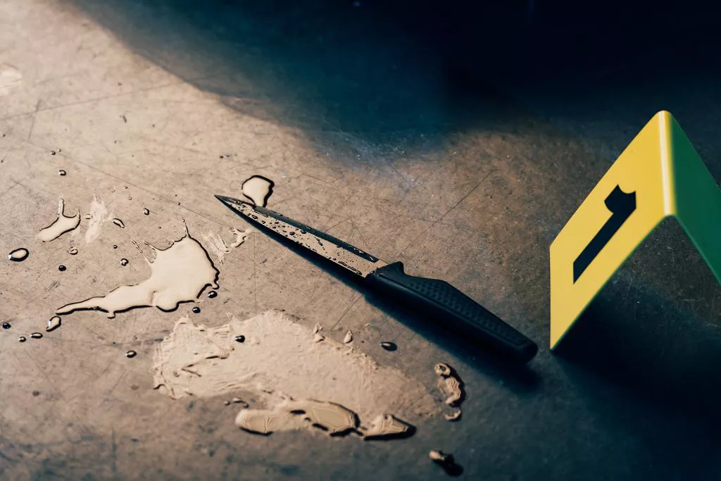 stock-photo-knife-evidence-marker-blood-stains
